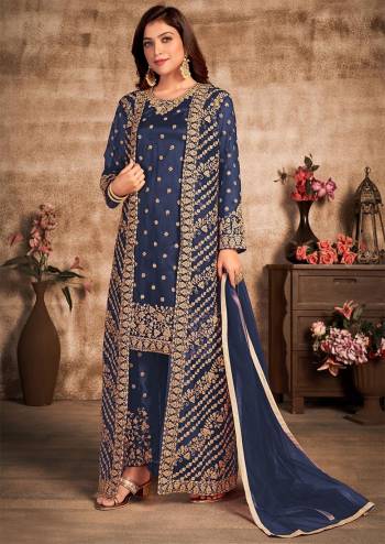 Stylist This Partywear Designer Long Length Suit With Jacket In Lovely Dark Color.Its Pretty Heavy Designer Thread,Sequance Embroidery Work Top Is Net Based Paired With Satin Bottom And Net Fabricated Dupatta Which Gives An Attractive To The Suit.Buy Now.