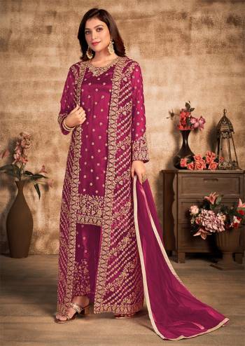 Stylist This Partywear Designer Long Length Suit With Jacket In Lovely Dark Color.Its Pretty Heavy Designer Thread,Sequance Embroidery Work Top Is Net Based Paired With Satin Bottom And Net Fabricated Dupatta Which Gives An Attractive To The Suit.Buy Now.