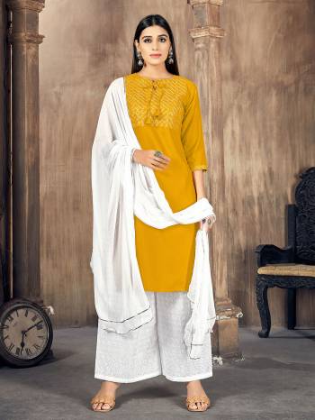 Stylist This Readymade Long Kurti Plazzo Suits In Fine Color.Its Kurti And Bottom Are Rayon And Dupatta Are Chiffon Fabricated Beautified With Designer Embroidery Work. It Is Light In Weight And Easy To Carry All Day Long. Buy Now.