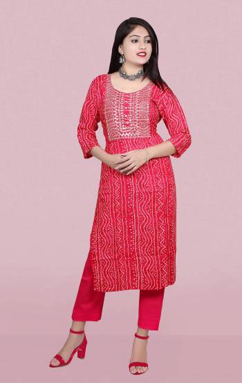 Attrective This Readymade Long Kurti In Fine Color Fabricated On Rayon Beautified With Bandhani Printed Designer With Embroidery Work. It Is Light In Weight And Easy To Carry All Day Long. 