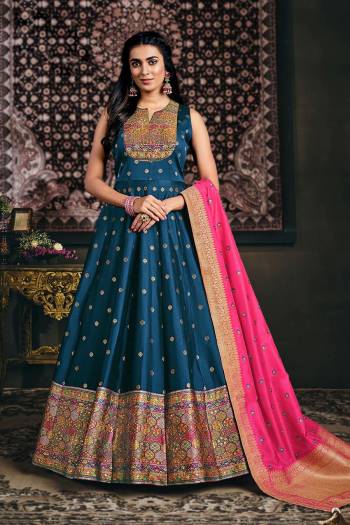 Flaunt Your Rich And Elegant Taste Wearing This Designer Readymade Long Gown With Dupatta In Fine Color. This  Pretty Gown Is Jacquard Silk And Dupatta Are Net Fabricated Beautified With Heavy Multy Color Wevon Jacquard Designer. Its Fabric Is Soft Towards Skin And Easy To Carry All Day Long. 