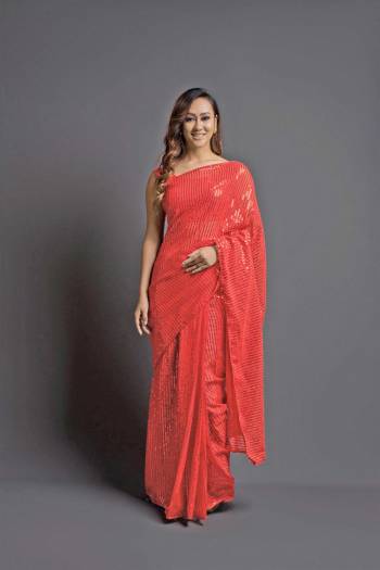 Looking This Designer Fancy Saree Paired With Blouse.This Saree Are Georgette And Blouse Are Banglori Silk Based Fabric With Designer Sequance Embroidery Work. Buy This Pretty Saree Now.