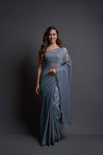 Looking This Designer Fancy Saree Paired With Blouse.This Saree Are Georgette And Blouse Are Banglori Silk Based Fabric With Designer Sequance Embroidery Work. Buy This Pretty Saree Now.