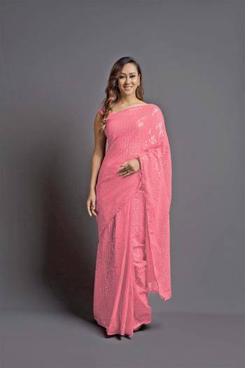 Looking This Designer Fancy Saree Paired With Blouse.This Saree Are Georgette And Blouse Are Banglori Silk Based Fabric With Designer Sequance Embroidery Work. Buy This Pretty Saree Now.