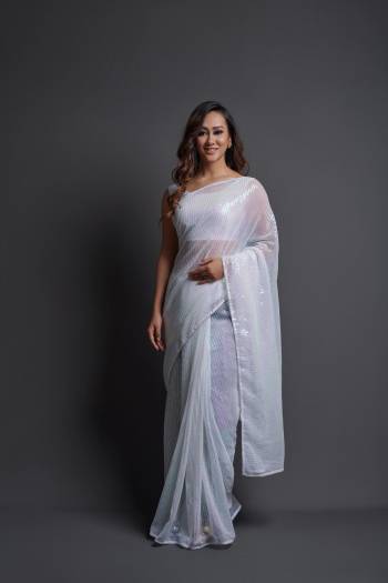 Looking This Designer Fancy Saree Paired With Blouse.This Saree Are Georgette And Blouse Are Banglori Silk Based Fabric With Designer Sequance Embroidery Work. Buy This Pretty Saree Now.