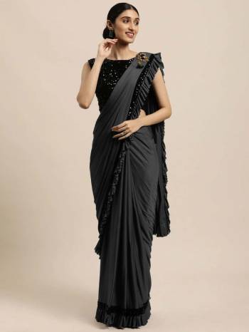 Looking This Partywear Readt To Wear Saree Are Fine Saree Paired With Contrasted Blouse.This Embellished Border Saree Are Poly Crepe And Blouse Are Benglori Silk Fabric With Designer Sequance Embroidery Work. Buy This Pretty Saree Now.