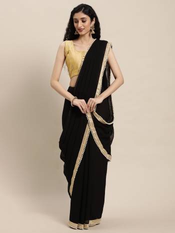 Designer This Partywear Fine Color Saree Paired With Contrasted Blouse.This Saree Are Georgette And Blouse Are Poly Silk Fabric With Designer Moti Work Lace Border. Buy This Pretty Saree Now.