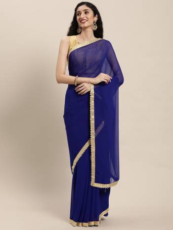 Designer This Partywear Fine Color Saree Paired With Contrasted Blouse.This Saree Are Georgette And Blouse Are Poly Silk Fabric With Designer Moti Work Lace Border. Buy This Pretty Saree Now.