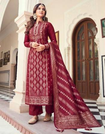 Looking This Designer Suits In Lovely Color.?Its Pretty Heavy Weaving Jacquard Designer Top Is Viscose Dola Silk Based Paired Bottom Dull Santoon With Viscose Dola Silk Fabricated Dupatta Which Gives An Attractive To The Dress.