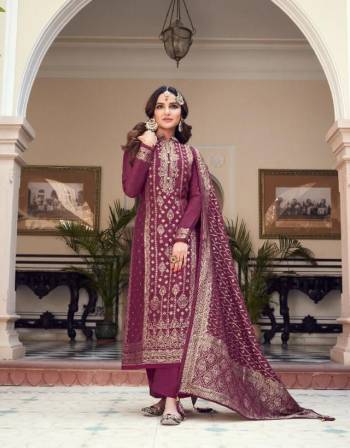 Looking This Designer Suits In Lovely Color.?Its Pretty Heavy Weaving Jacquard Designer Top Is Viscose Dola Silk Based Paired Bottom Dull Santoon With Viscose Dola Silk Fabricated Dupatta Which Gives An Attractive To The Dress.