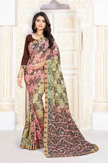 Garb This Designer Saree Are Fine Saree Paired With Blouse.This Saree And Blouse Are Art Silk Based Fabric With Digital Printed With Brasso Work. Buy This Pretty Saree Now.