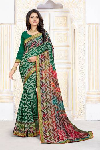 Garb This Designer Saree Are Fine Saree Paired With Blouse.This Saree And Blouse Are Art Silk Based Fabric With Digital Printed With Brasso Work. Buy This Pretty Saree Now.