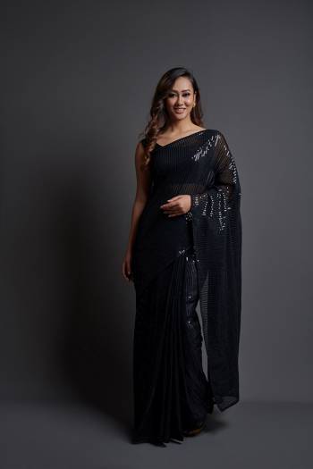 Attrective This Designer Partywear Saree Are Fine Dark Color Saree Paired With Blouse.This Saree Are Georgette And Blouse Are Banglori Silk Based Fabric With Heavy Designer Sequance Embroidery Work. Buy This Pretty Saree Now.