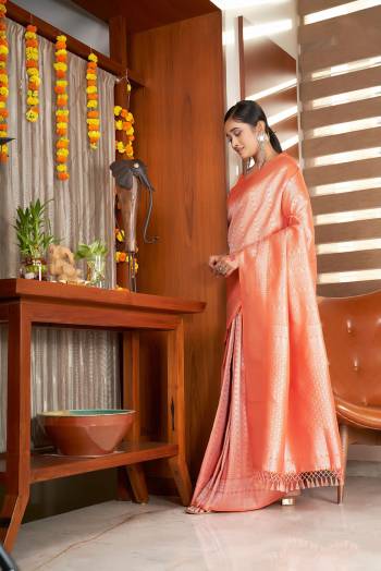 Attrective Looking This Fastivel Saree Are Fine Saree Paired With Blouse.This Saree And Blouse Are Kanjivaram Silk Based Fabric With Heavy Wevon Designer Work. Buy This Pretty Saree Now.