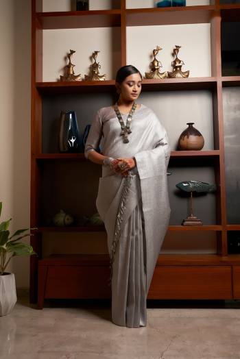 Attrective Looking This Fastivel Saree Are Fine Saree Paired With Blouse.This Saree And Blouse Are Kanjivaram Silk Based Fabric With Heavy Wevon Designer Work. Buy This Pretty Saree Now.