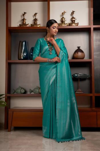 Attrective Looking This Fastivel Saree Are Fine Saree Paired With Blouse.This Saree And Blouse Are Kanjivaram Silk Based Fabric With Heavy Wevon Designer Work. Buy This Pretty Saree Now.