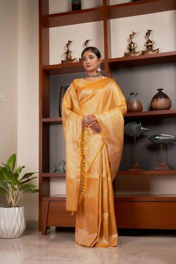 Attrective Looking This Fastivel Saree Are Fine Saree Paired With Blouse.This Saree And Blouse Are Kanjivaram Silk Based Fabric With Heavy Wevon Designer Work. Buy This Pretty Saree Now.