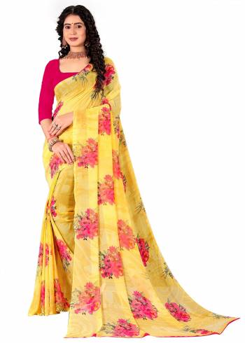 Garb This Saree Paired With Contrasted Blouse.This Saree And Blouse Are Georgette Based Fabric With Designer Printed. Buy This Pretty Saree Now.