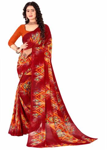 Garb This Saree Paired With Contrasted Blouse.This Saree And Blouse Are Georgette Based Fabric With Designer Printed. Buy This Pretty Saree Now.