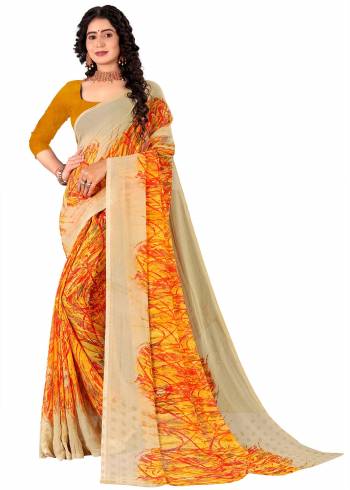 Garb This Saree Paired With Contrasted Blouse.This Saree And Blouse Are Georgette Based Fabric With Designer Printed. Buy This Pretty Saree Now.