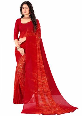 Garb This Saree Paired With Contrasted Blouse.This Saree And Blouse Are Georgette Based Fabric With Designer Printed. Buy This Pretty Saree Now.