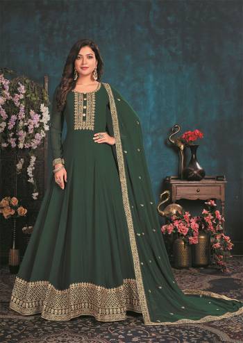 Partywear Long Length Gown Suit In Lovely Dark Color.Its Pretty Heavy Designer Thread Embroidery Work Top Is Faux Georgette Based Paired With Santoon Bottom And Faux Georgette Fabricated Dupatta Which Gives An Attractive To The Suit.Buy Now.