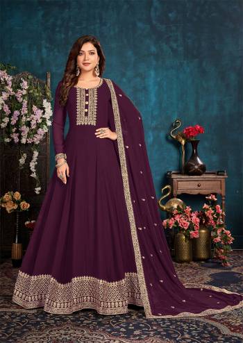 Partywear Long Length Gown Suit In Lovely Dark Color.Its Pretty Heavy Designer Thread Embroidery Work Top Is Faux Georgette Based Paired With Santoon Bottom And Faux Georgette Fabricated Dupatta Which Gives An Attractive To The Suit.Buy Now.