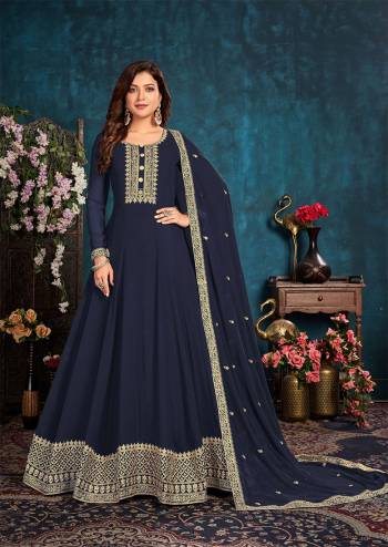 Partywear Long Length Gown Suit In Lovely Dark Color.Its Pretty Heavy Designer Thread Embroidery Work Top Is Faux Georgette Based Paired With Santoon Bottom And Faux Georgette Fabricated Dupatta Which Gives An Attractive To The Suit.Buy Now.