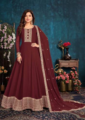 Partywear Long Length Gown Suit In Lovely Dark Color.Its Pretty Heavy Designer Thread Embroidery Work Top Is Faux Georgette Based Paired With Santoon Bottom And Faux Georgette Fabricated Dupatta Which Gives An Attractive To The Suit.Buy Now.