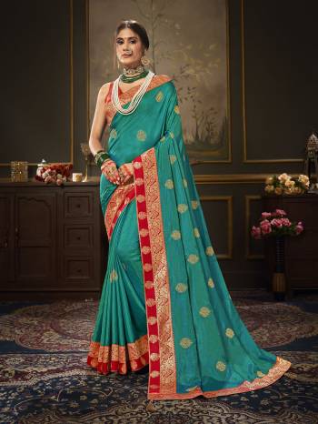 Enhance Your Personality In This Lovely Colored Designer Saree. This Saree Are Dola Silk And Blouse Are Art Silk Jacquard Fabric With Heavy Jari Embroidery Embroidery Work. Buy This Pretty Saree Now.