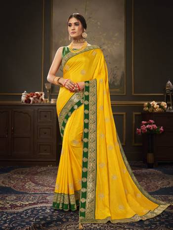 Enhance Your Personality In This Lovely Colored Designer Saree. This Saree Are Dola Silk And Blouse Are Art Silk Jacquard Fabric With Heavy Jari Embroidery Embroidery Work. Buy This Pretty Saree Now.