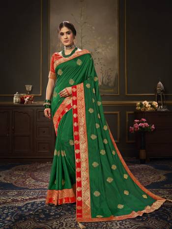 Enhance Your Personality In This Lovely Colored Designer Saree. This Saree Are Dola Silk And Blouse Are Art Silk Jacquard Fabric With Heavy Jari Embroidery Embroidery Work. Buy This Pretty Saree Now.