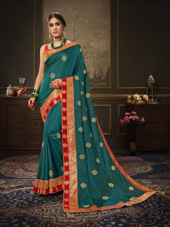 Enhance Your Personality In This Lovely Colored Designer Saree. This Saree Are Dola Silk And Blouse Are Art Silk Jacquard Fabric With Heavy Jari Embroidery Embroidery Work. Buy This Pretty Saree Now.