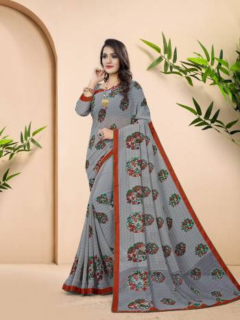 Grab This Designer Printed Saree Are Beautifull Color Paired With Pretty Blouse.This Saree And Blouse Are Georgette Based Fabric With Designer Printed With Lace Border And Piping. Buy This Pretty Saree Now.