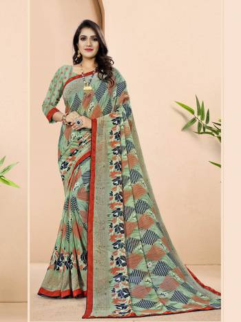 Grab This Designer Printed Saree Are Beautifull Color Paired With Pretty Blouse.This Saree And Blouse Are Georgette Based Fabric With Designer Printed With Lace Border And Piping. Buy This Pretty Saree Now.