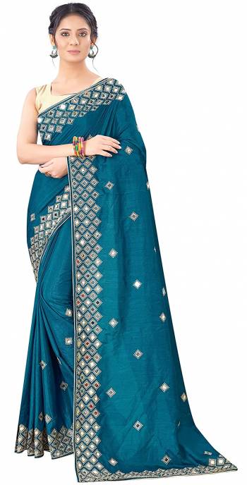 Designer Partywear Pretty Color Saree Paired With Lovely Blouse.This Saree is Vichitra Silk And Blouse is Art Silk Based Fabric With Heavy Designer Mirror With Jari Embroidery Work. Buy This Pretty Saree Now.