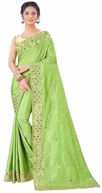 Designer Partywear Pretty Color Saree Paired With Lovely Blouse.This Saree is Vichitra Silk And Blouse is Art Silk Based Fabric With Heavy Designer Mirror With Jari Embroidery Work. Buy This Pretty Saree Now.