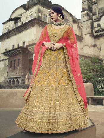 Look Attractive In This Designer Heavy Lehenga Choli In Ptrtty Color Paired?With Lovely Blouse And Dupatta. This Blouse And Lehenga Are Fabricated On Satin Paired With Soft Net Fabricated Dupatta. It Has Heavy Designer Glitter Dori,Jari With Thread Embroidery And Stone Work.Buy Now.