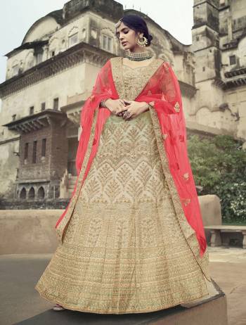 Look Attractive In This Designer Heavy Lehenga Choli In Ptrtty Color Paired?With Lovely Blouse And Dupatta. This Blouse And Lehenga Are Fabricated On Satin Paired With Soft Net Fabricated Dupatta. It Has Heavy Designer Glitter Dori,Jari With Thread Embroidery And Stone Work.Buy Now.