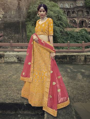 Look Attractive In This Designer Heavy Lehenga Choli In Ptrtty Color Paired?With Lovely Blouse And Dupatta. This Blouse And Lehenga Are Fabricated On Satin Paired With Soft Net Fabricated Dupatta. It Has Heavy Designer Glitter Dori,Jari With Thread Embroidery And Stone Work.Buy Now.