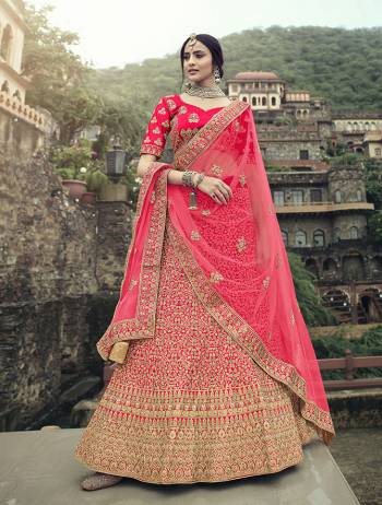 Look Attractive In This Designer Heavy Lehenga Choli In Ptrtty Color Paired?With Lovely Blouse And Dupatta. This Blouse And Lehenga Are Fabricated On Satin Paired With Soft Net Fabricated Dupatta. It Has Heavy Designer Glitter Dori,Jari With Thread Embroidery And Stone Work.Buy Now.