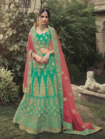 Look Attractive In This Designer Heavy Lehenga Choli In Ptrtty Color Paired?With Lovely Blouse And Dupatta. This Blouse And Lehenga Are Fabricated On Satin Paired With Soft Net Fabricated Dupatta. It Has Heavy Designer Glitter Dori,Jari With Thread Embroidery And Stone Work.Buy Now.