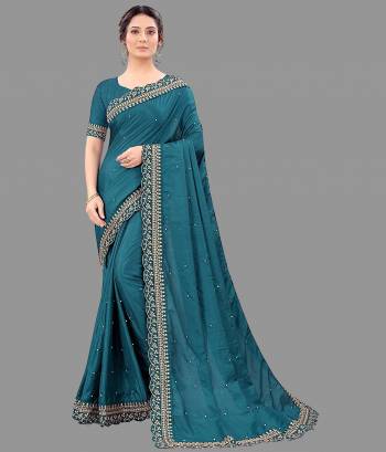 Looking Beautifull In This Designer Saree Are Pretty Color Paired With Designer Blouse.This Saree Are Vichitra Silk And Blouse Are Benglori Silk Based Fabric With Designer Embroidery Cut Work Lace Border With Moti Work. Buy This Pretty Saree Now.