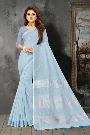 Enhance Your Personality In This Lovely Colored Designer Saree. This Saree And Blouse Are Linen Based Fabric With Heavy Wevon Pallu Border Designer. Buy This Pretty Saree Now.