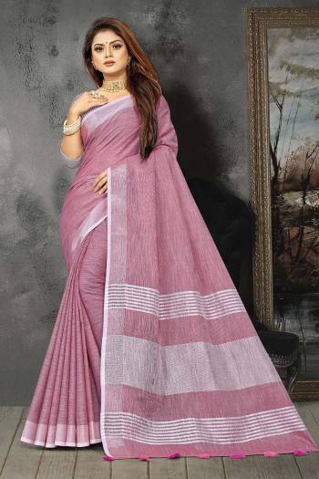 Enhance Your Personality In This Lovely Colored Designer Saree. This Saree And Blouse Are Linen Based Fabric With Heavy Wevon Pallu Border Designer. Buy This Pretty Saree Now.