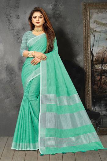 Enhance Your Personality In This Lovely Colored Designer Saree. This Saree And Blouse Are Linen Based Fabric With Heavy Wevon Pallu Border Designer. Buy This Pretty Saree Now.