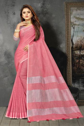 Enhance Your Personality In This Lovely Colored Designer Saree. This Saree And Blouse Are Linen Based Fabric With Heavy Wevon Pallu Border Designer. Buy This Pretty Saree Now.