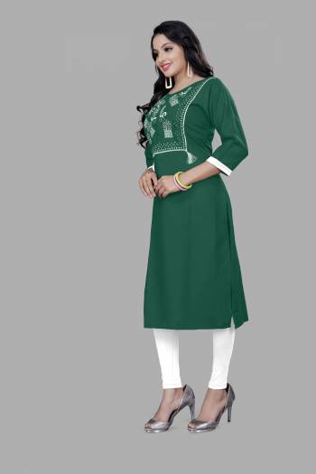 Grab This Readymade Long Kurti In Dark Color. This Kurti Is Ruby Cotton Blend Fabricated Beautified With Designer Lukhnovi Embroidery WorkWith Tussels. It Is Light In Weight And Easy To Carry All Day Long. 