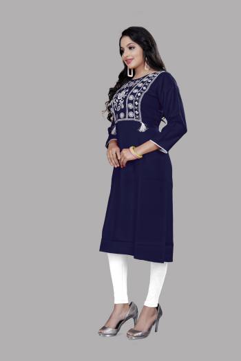 Grab This Readymade Long Kurti In Dark Color. This Kurti Is Ruby Cotton Blend Fabricated Beautified With Designer Lukhnovi Embroidery WorkWith Tussels. It Is Light In Weight And Easy To Carry All Day Long. 