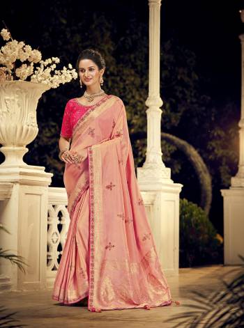 For A Royal And Beautiful Look, Grab This Beautifull Saree In Pretty Color Paired With Pretty Colored Blouse. This Saree Is Fabricated On Viscose Dola Silk Paired With Raw Silk Fabricated Blouse.